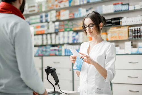pharmacist selling medication