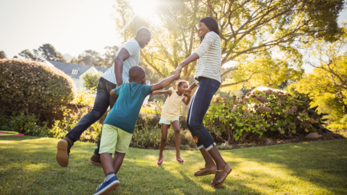 Oncology Family Plays Outdoor Sunshine Stock
