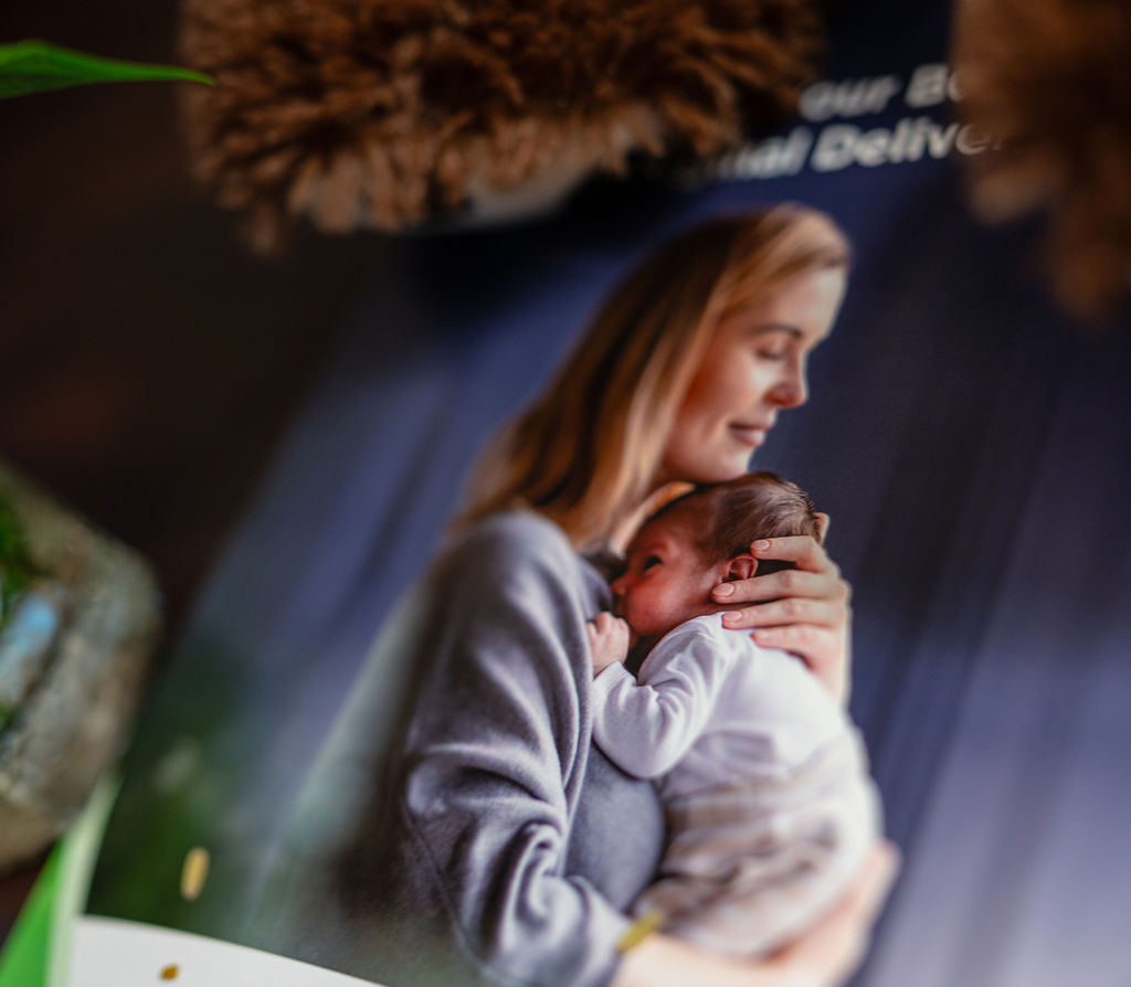 Woman embracing baby