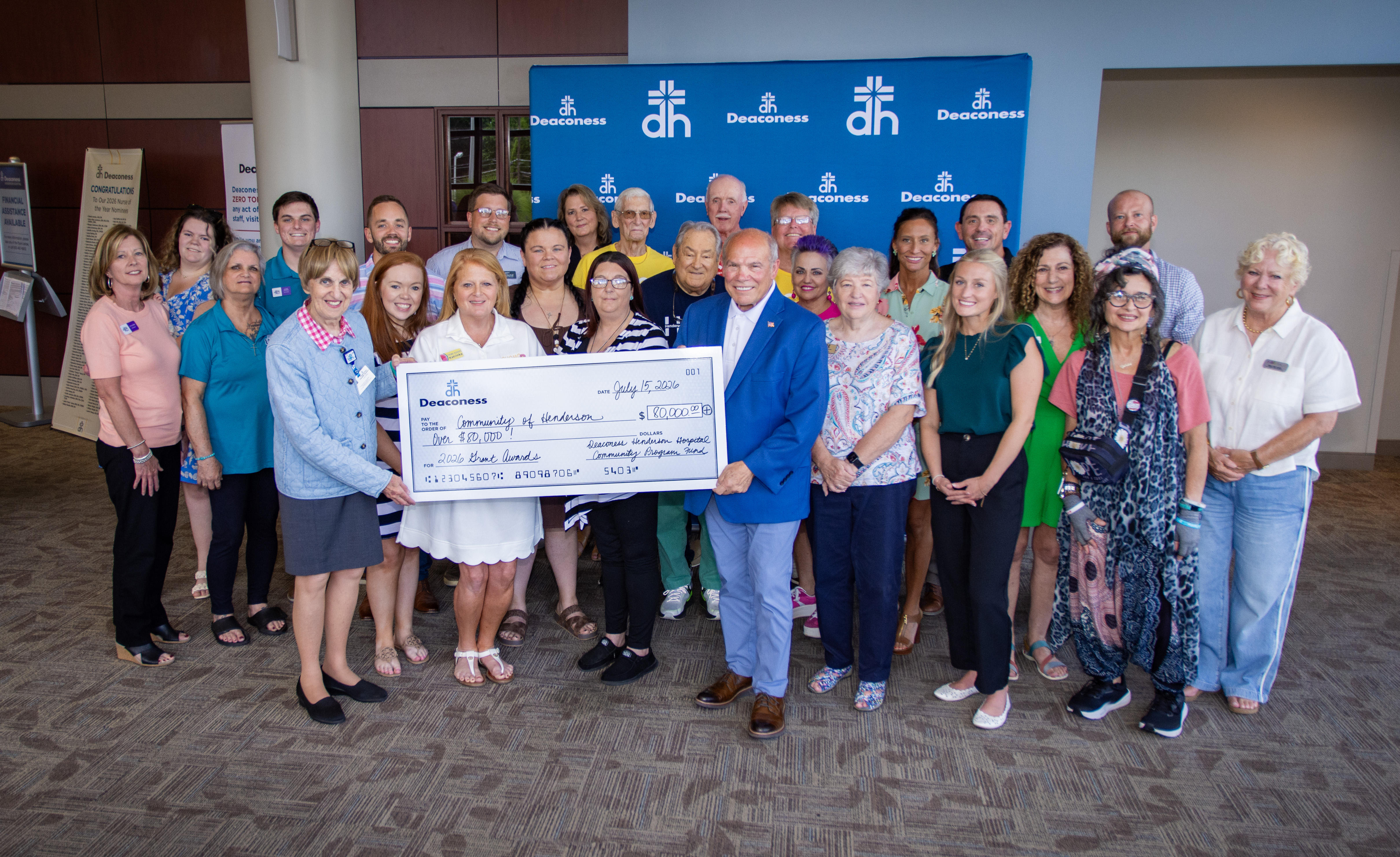 Deaconess Leadership presents check to Community of Henderson